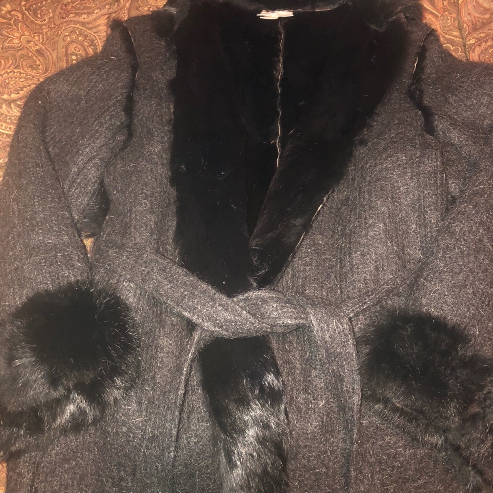 Black wool outer, rabbit fur inner, Tie belt, fur tab back cuffs. Sz M